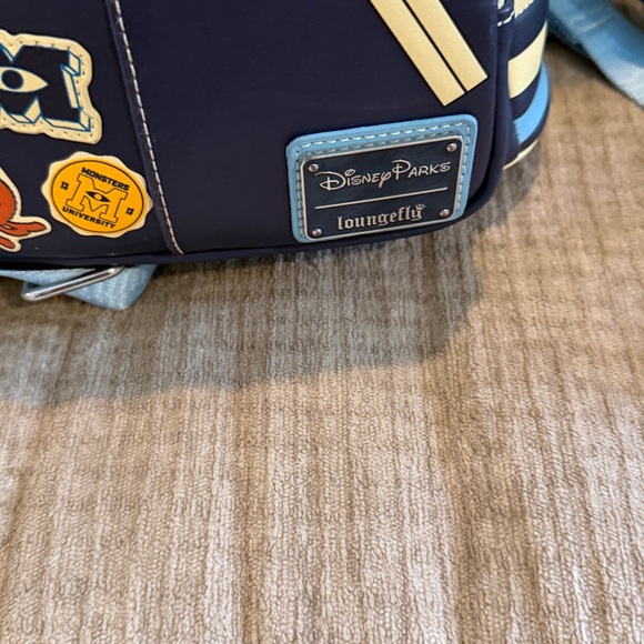 Disney Monsters University varsity jacket Navy and Cream Backpack 10 x 8 - Picture 9 of 10